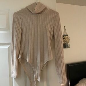 Tan soft body suit never worn